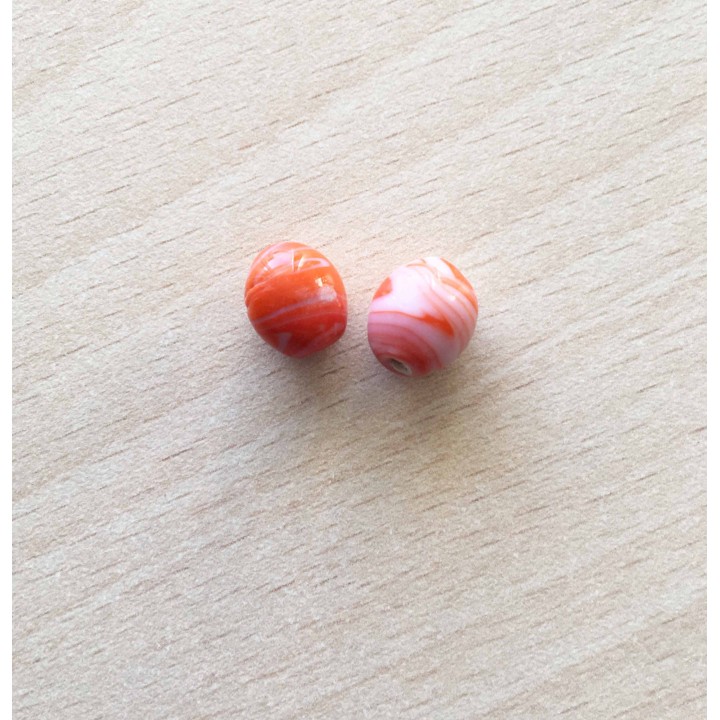 perle artisanale en verre  forme "amande" couleur: ambre 