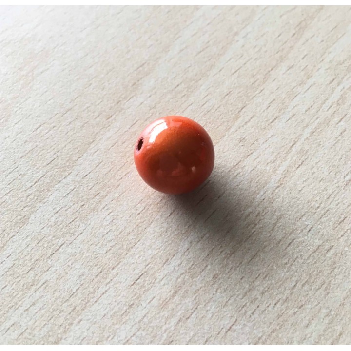 perle artisanale en verre  forme "amande" couleur: ambre 