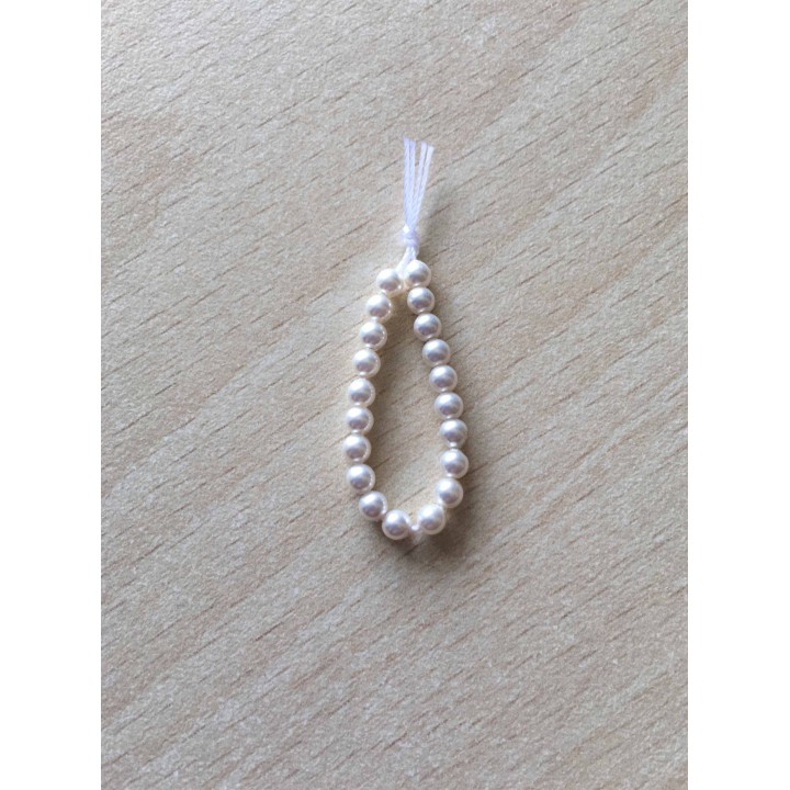 perle artisanale en verre  forme "amande" couleur: ambre 